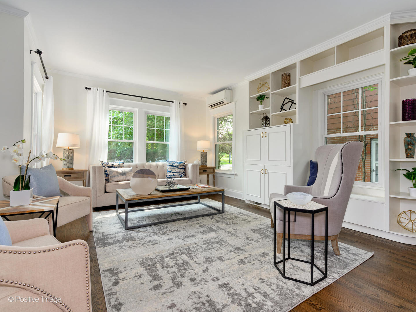 1137 Willow Road Winnetka, IL 60093 - Photo 2 of 31 a living room with furniture and a potted plant