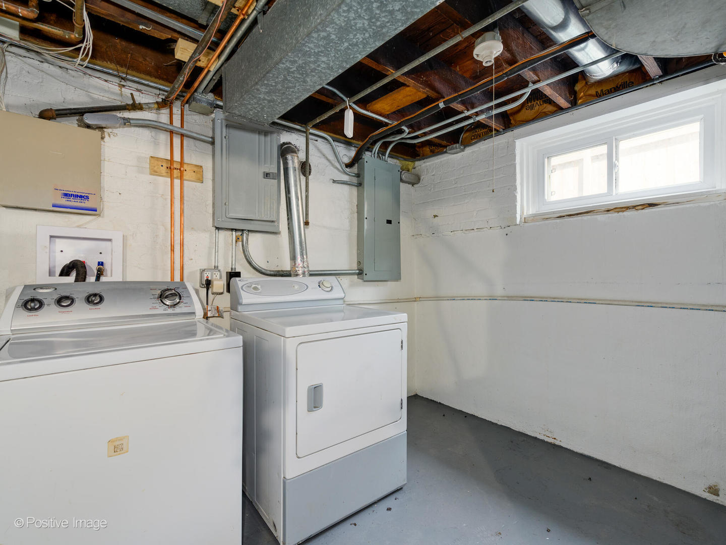 1137 Willow Road Winnetka, IL 60093 - Photo 26 of 31 a utility room with dryer and washer