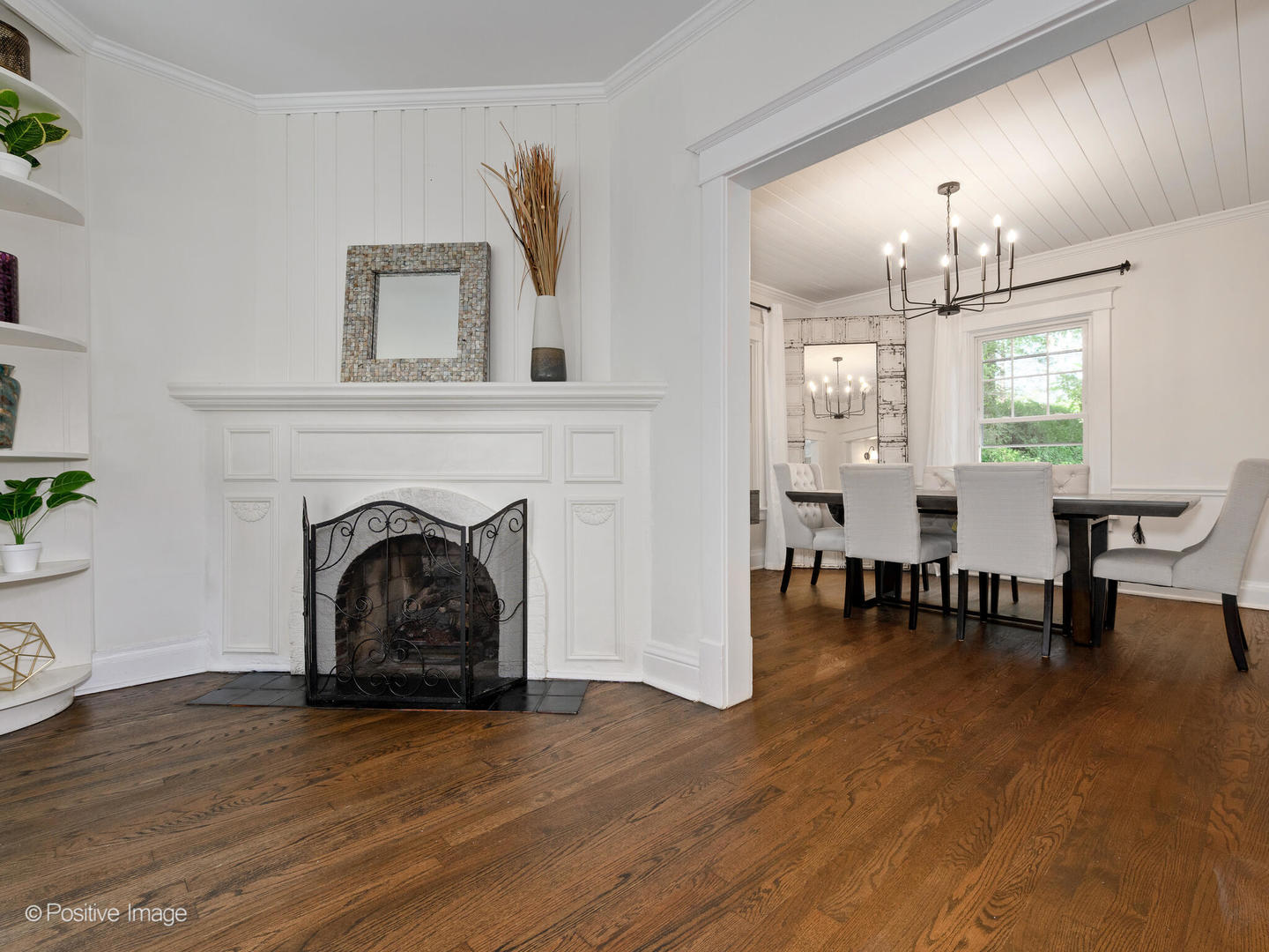 1137 Willow Road Winnetka, IL 60093 - Photo 5 of 31 a view of livingroom with furniture a fireplace and wooden floor