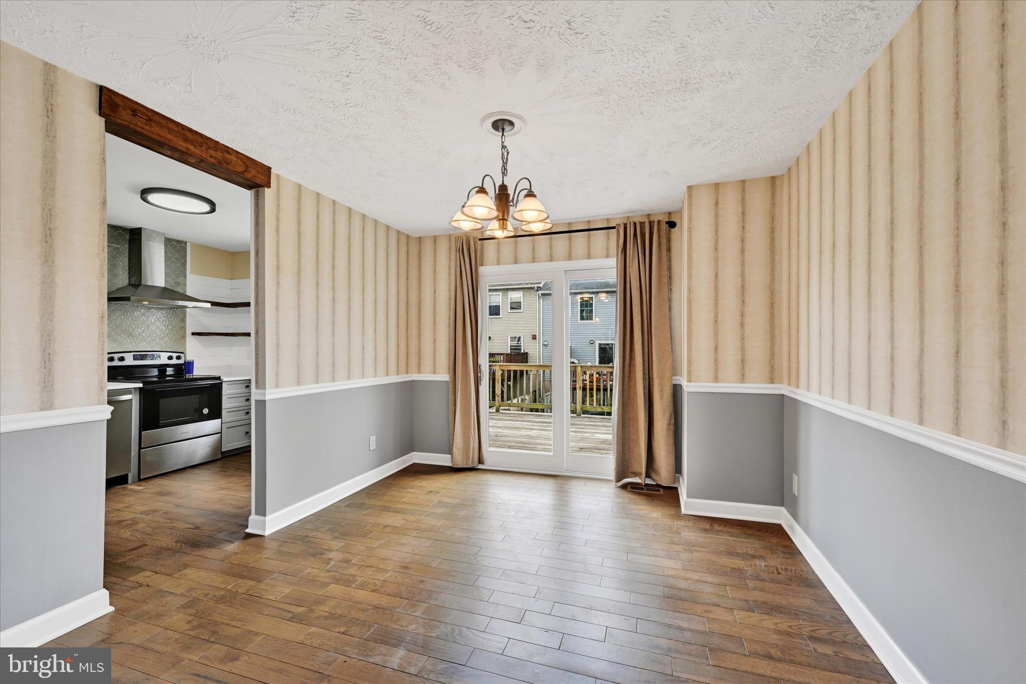 21 Allison Way Abingdon, MD 21009 - Photo 11 of 26 wooden floor in an empty room with a window