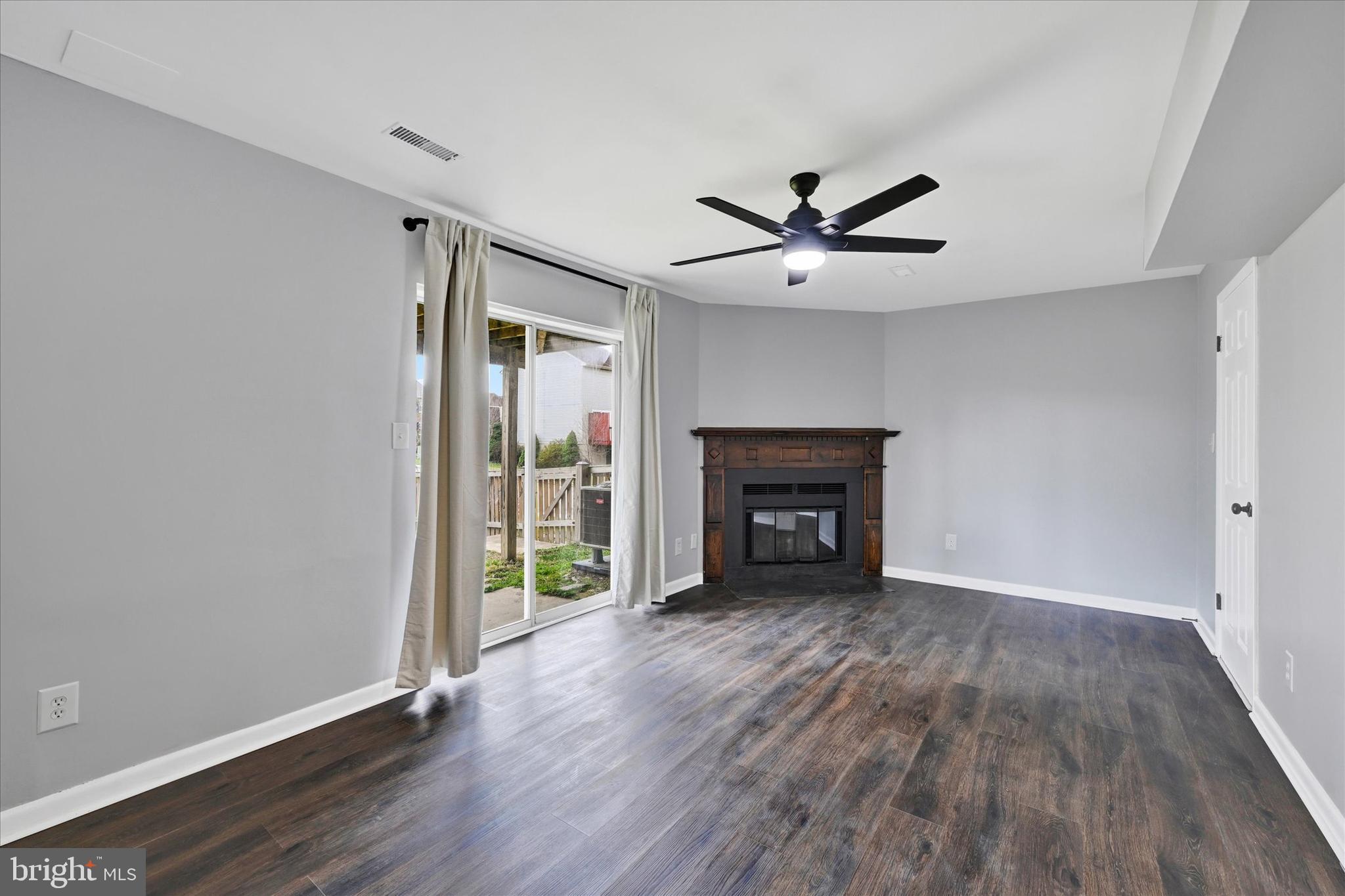 21 Allison Way Abingdon, MD 21009 - Photo 20 of 26 wooden floor in an empty room with a fireplace