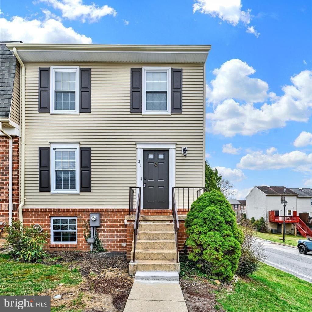 21 Allison Way Abingdon, MD 21009 - Photo 2 of 26 a front view of a house with a yard