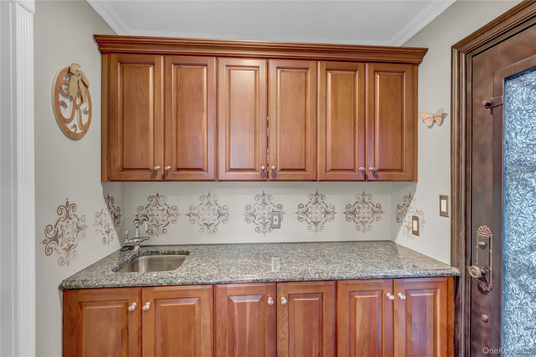 2 Riverview Terrace Smithtown, NY 11787 - Photo 12 of 48 a kitchen with granite countertop a sink and a granite countertops