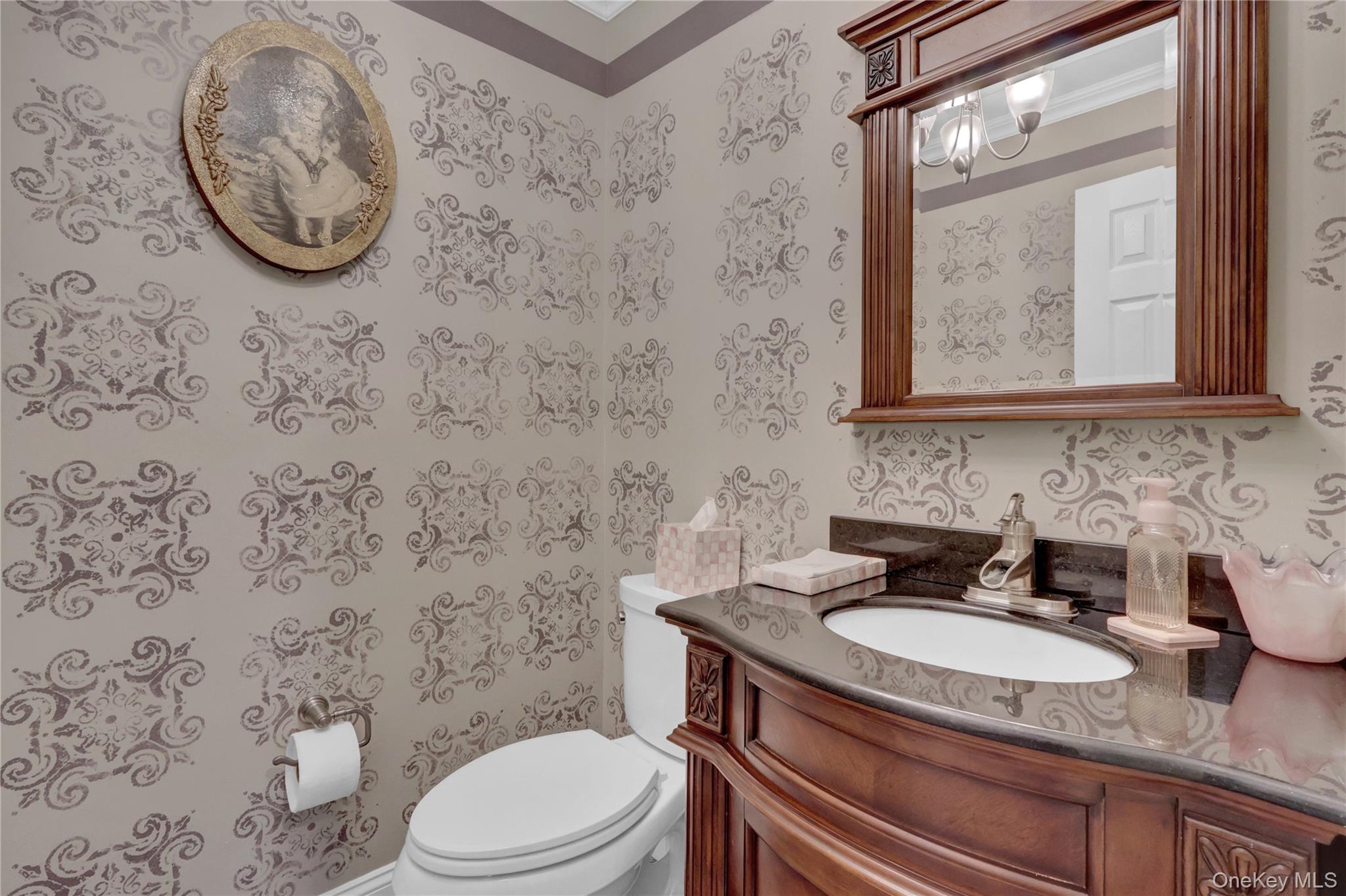 2 Riverview Terrace Smithtown, NY 11787 - Photo 14 of 48 a bathroom with a granite countertop toilet sink and mirror