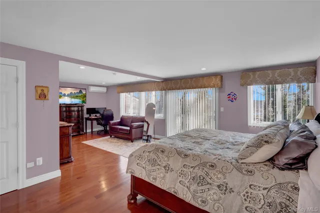 a bed room with a bed and furniture