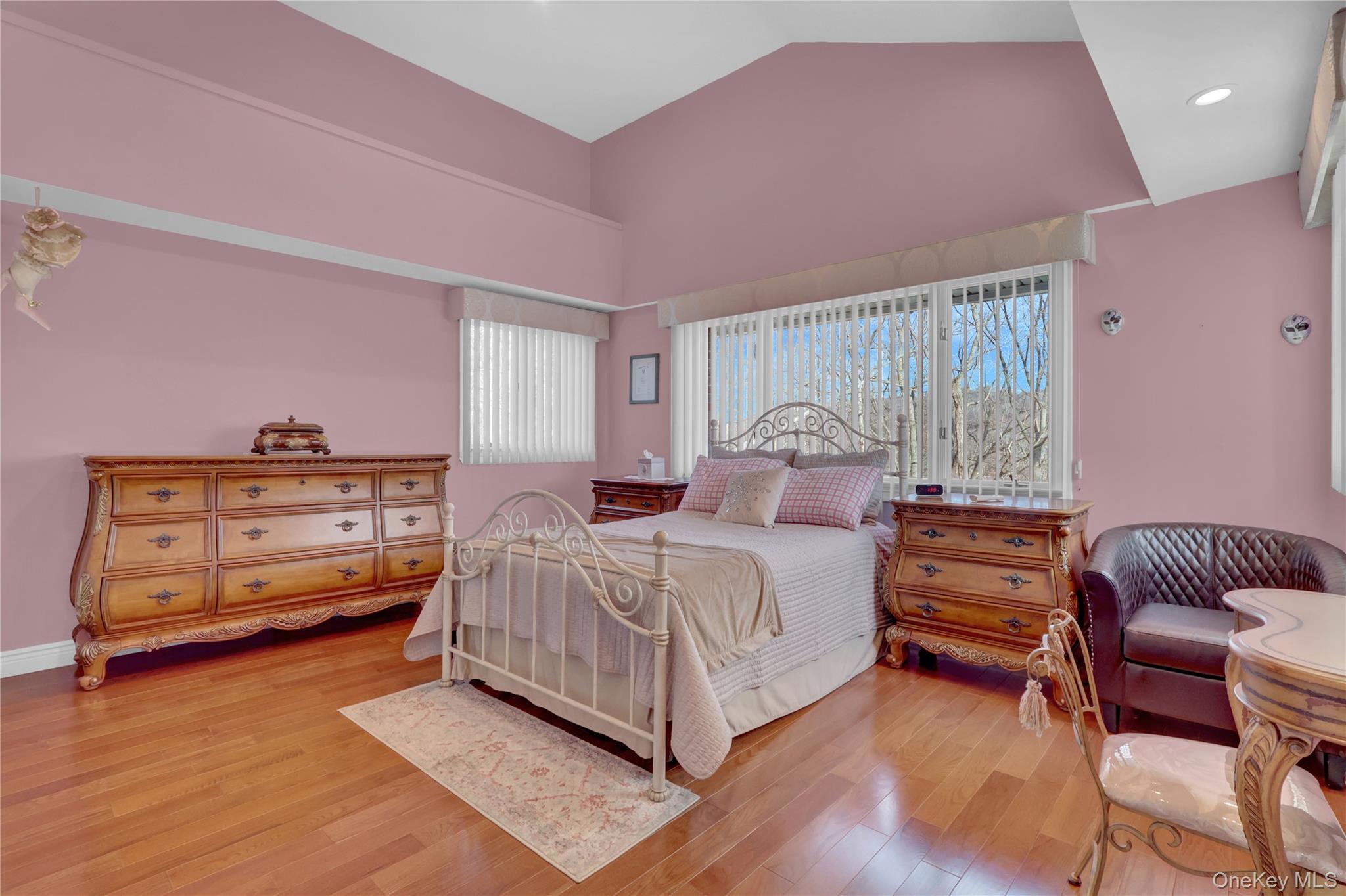 2 Riverview Terrace Smithtown, NY 11787 - Photo 26 of 48 a bedroom with a bed and a chair
