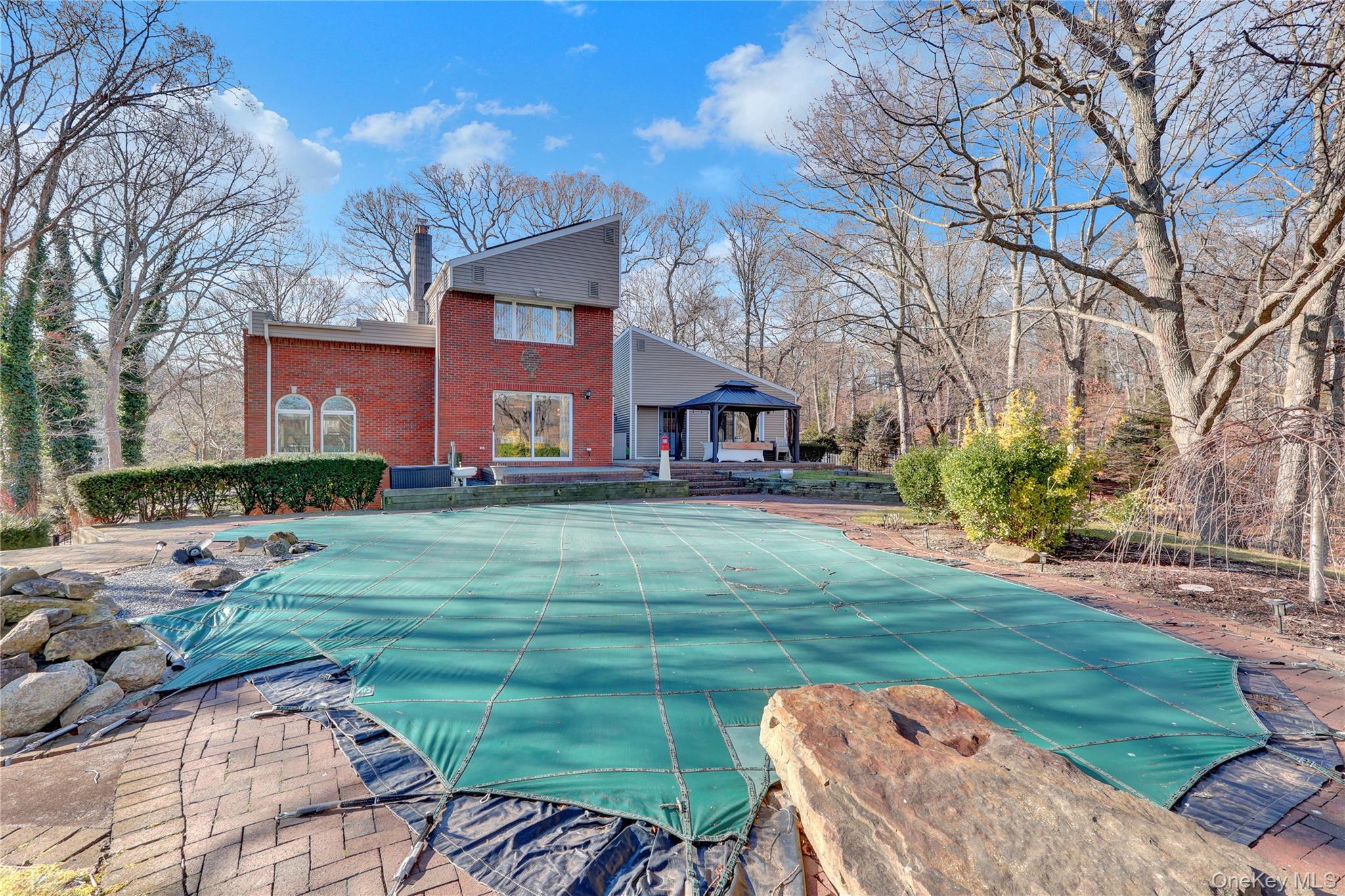 2 Riverview Terrace Smithtown, NY 11787 - Photo 43 of 48 a front view of a house with garden and porch