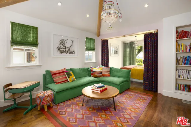 a bedroom with bed and window