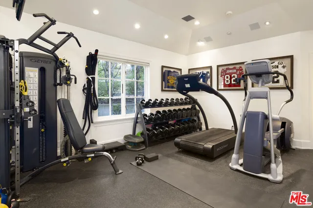 a kitchen with stainless steel appliances granite countertop a sink dishwasher stove and cabinets