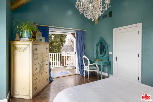 a bathroom with a toilet a sink and a mirror