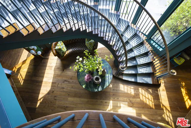a view of a swimming pool with seating area