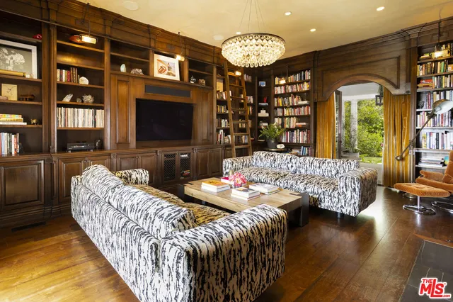a kitchen with stainless steel appliances granite countertop a sink and a stove