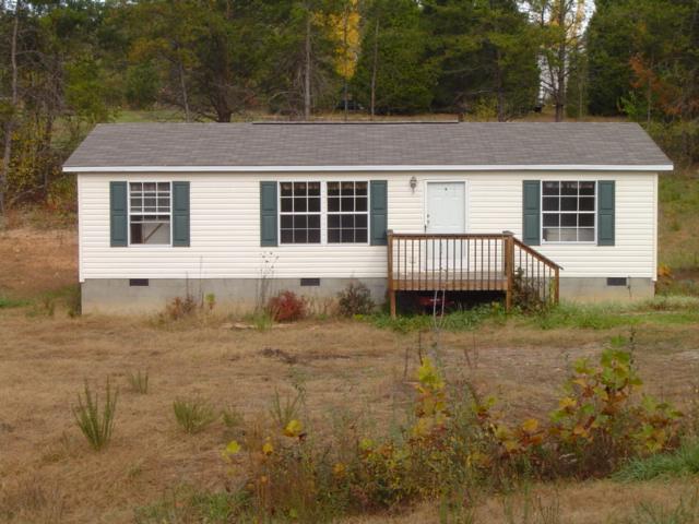 a view of front of a house with a yard