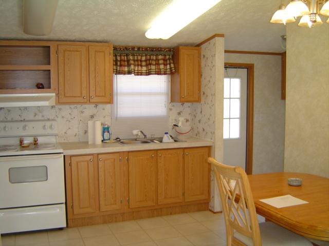 118 Spence Road Union Hall, VA 24176 - Photo 4 of 6 a kitchen with a sink cabinets and window