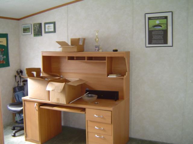 118 Spence Road Union Hall, VA 24176 - Photo 5 of 6 a room with a stove and a table
