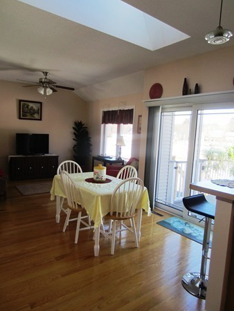 81 Osborne Road Ware, MA 01082 - Photo 11 of 26 a view of a dining room with furniture window and wooden floor