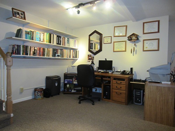 81 Osborne Road Ware, MA 01082 - Photo 26 of 26 a view of a workspace with a window and lounge chair