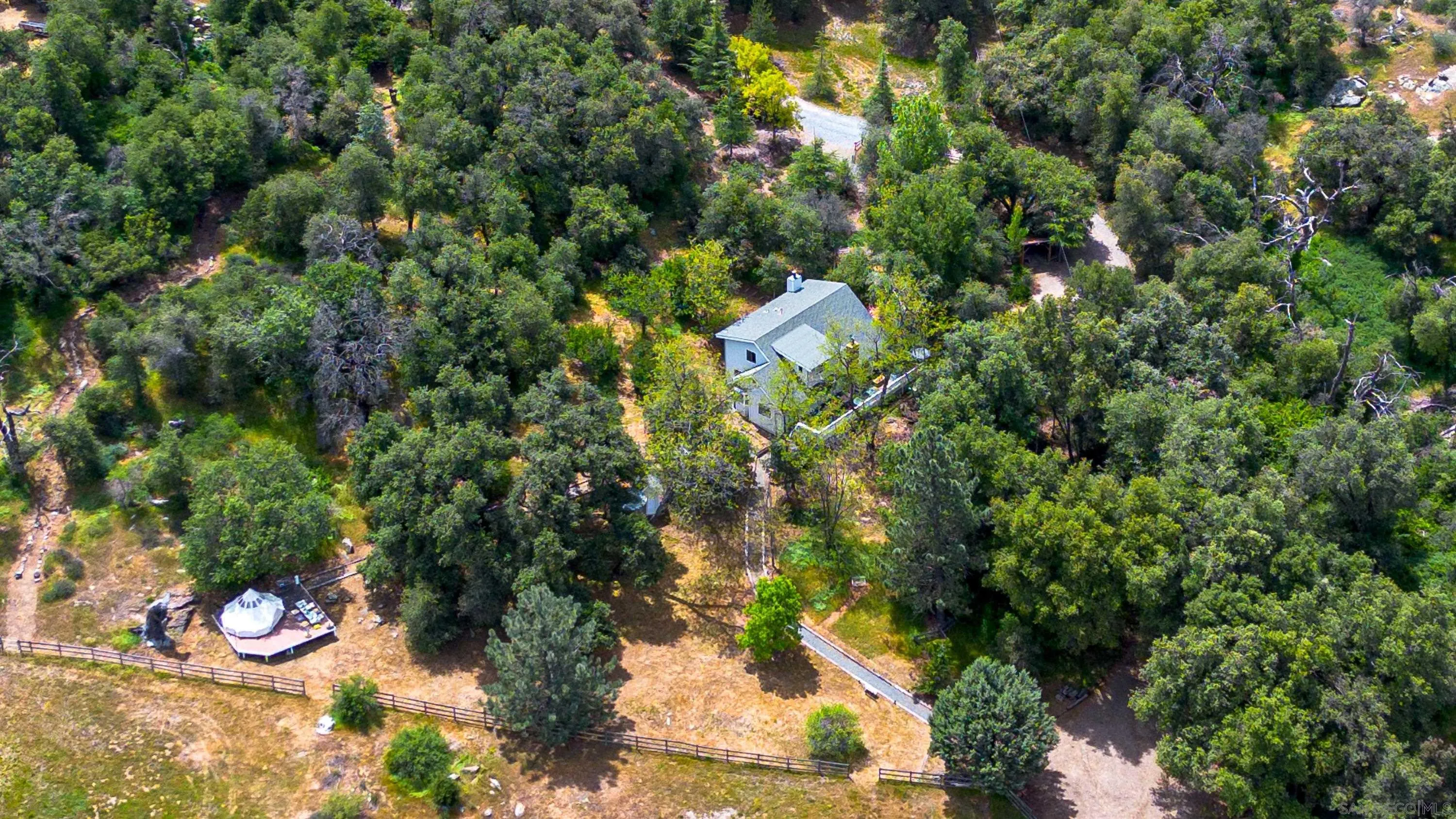 3517 Deer Lake Park Road Julian, CA 92036 - Photo 63 of 75 a view of a wooden fence and a fire pit