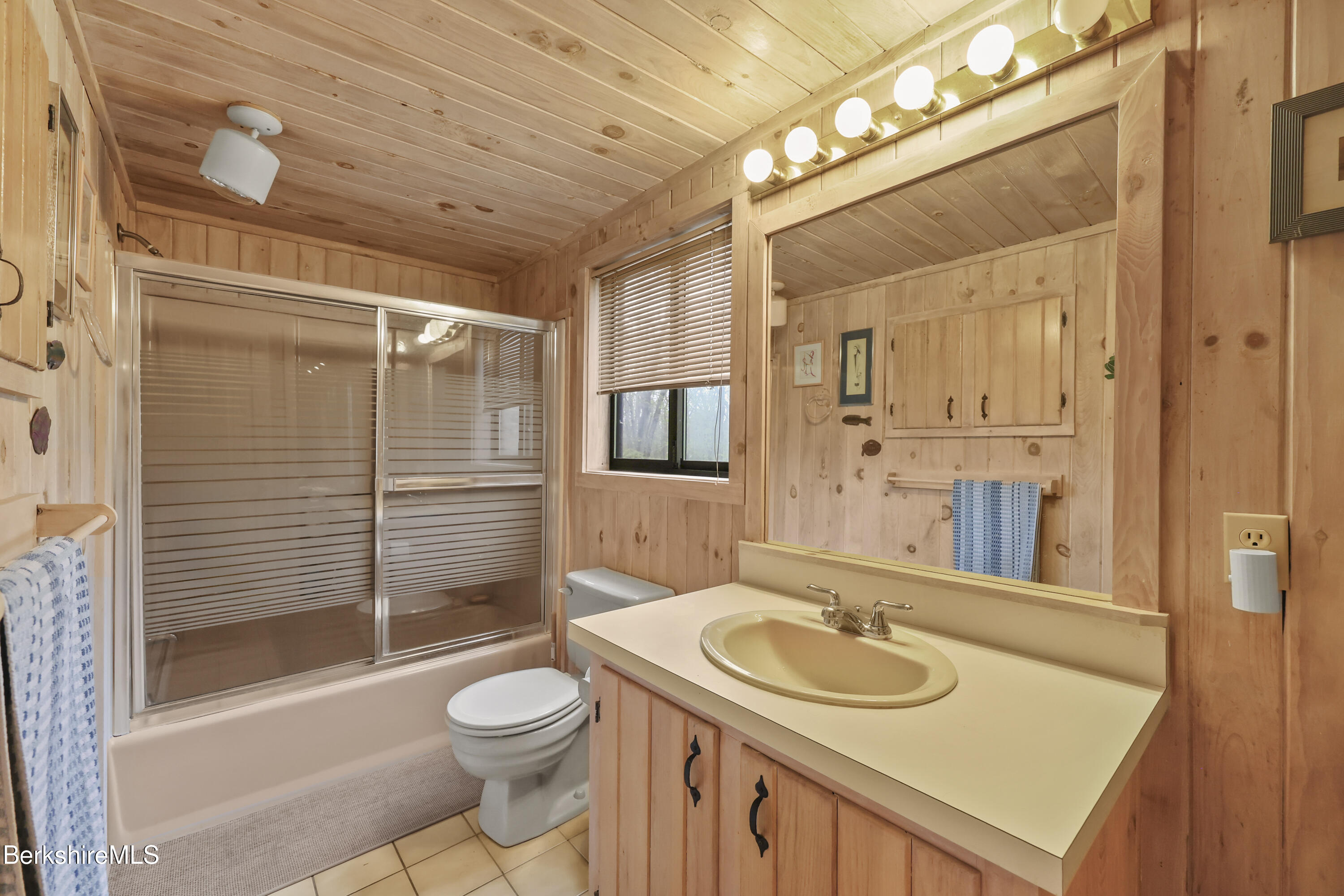 422 Bonny Rigg Hill Road Becket, MA 01223 - Photo 26 of 60 a bathroom with a sink toilet and shower