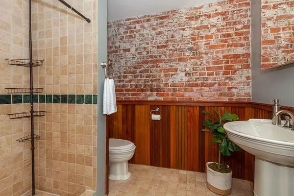 a bathroom with a sink and a toilet