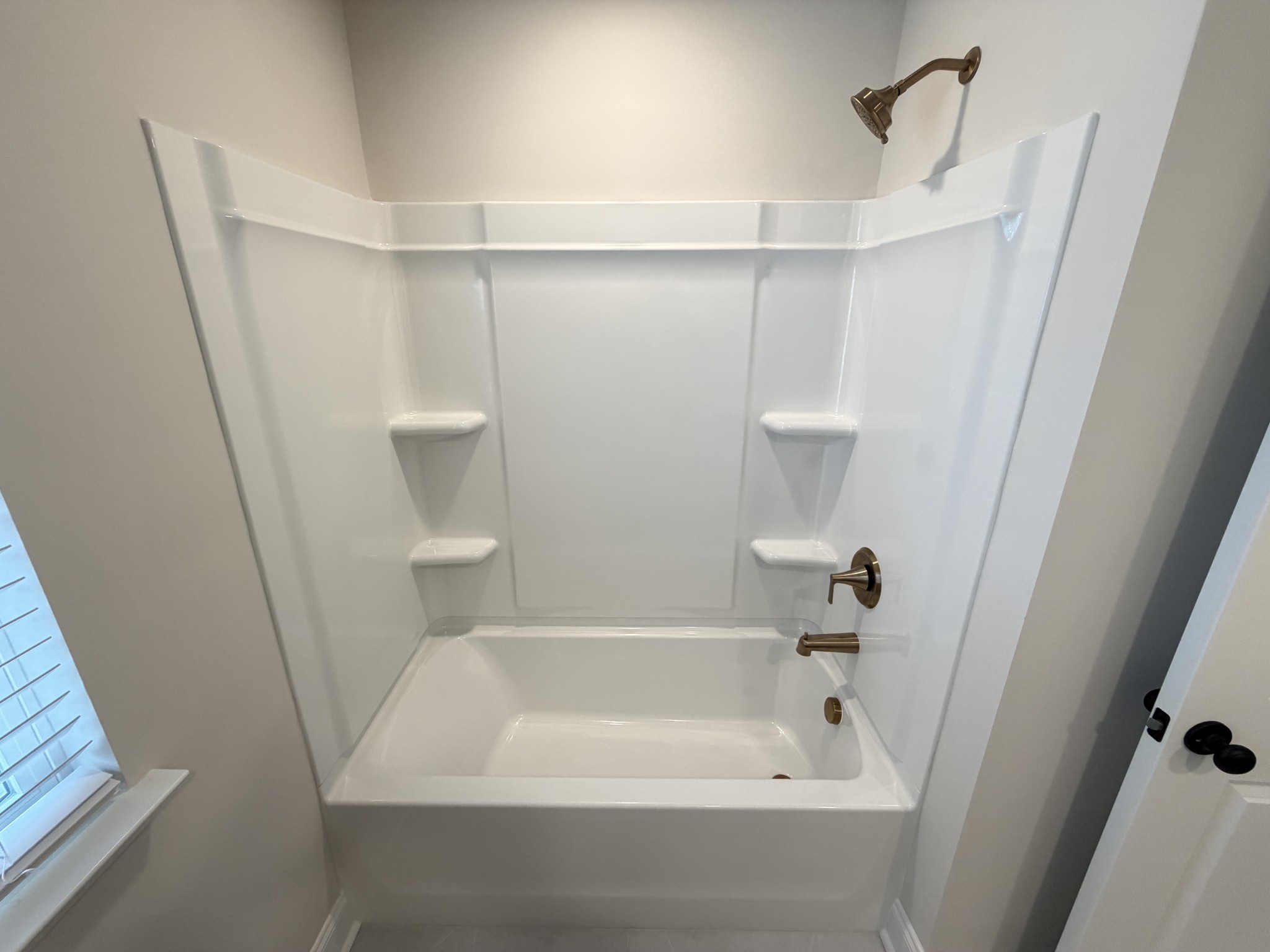 147 Emeline Way Mount Juliet, TN 37122 - Photo 27 of 41 a bathroom with a bathtub