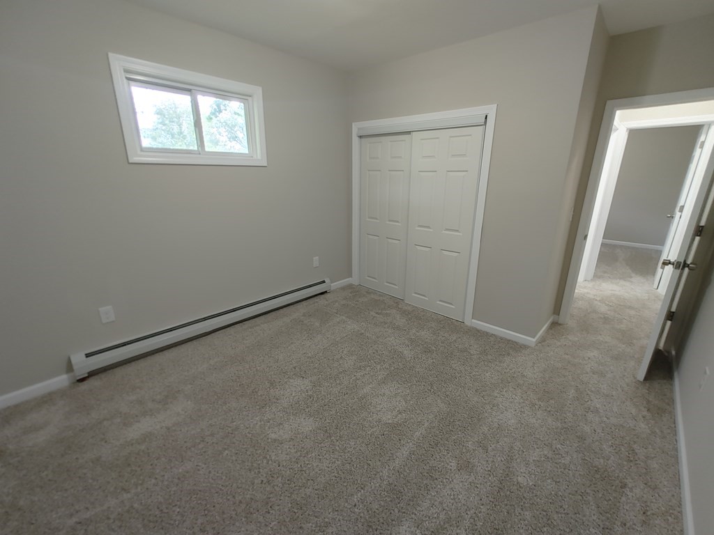 23 Eldert Street Springfield, MA 01109 - Photo 11 of 14 an empty room with windows