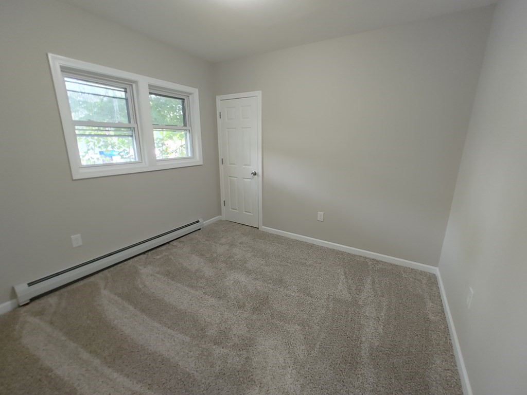 23 Eldert Street Springfield, MA 01109 - Photo 13 of 14 an empty room with a window