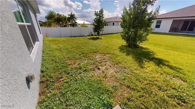 a view of swimming pool with a yard