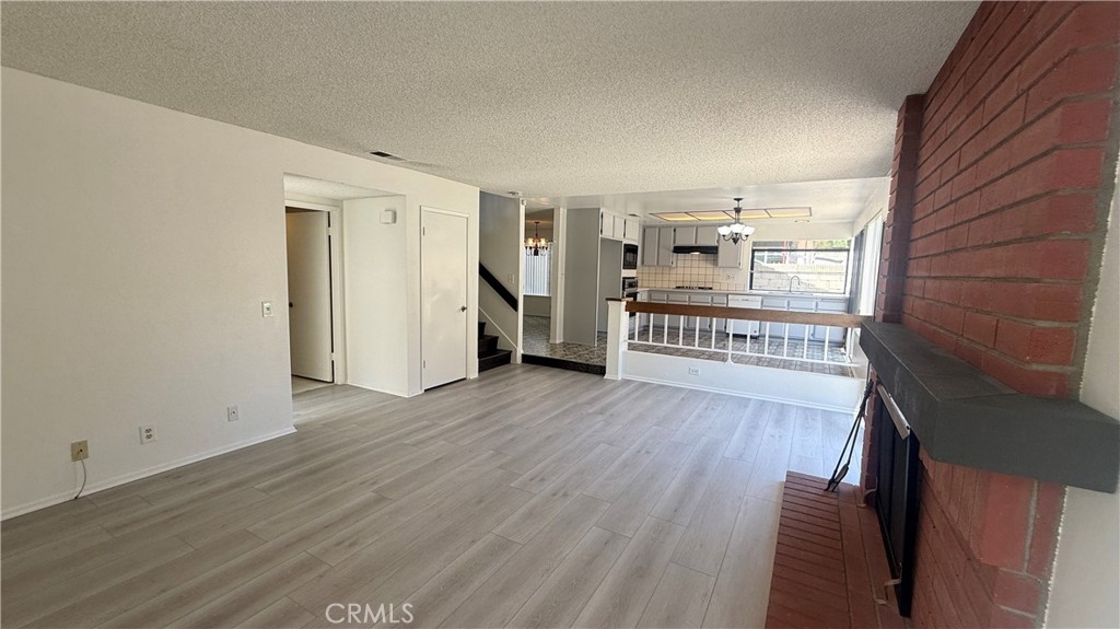 46 Christamon West Irvine, CA 92620 - Photo 21 of 65 wooden floor in an empty room with a window