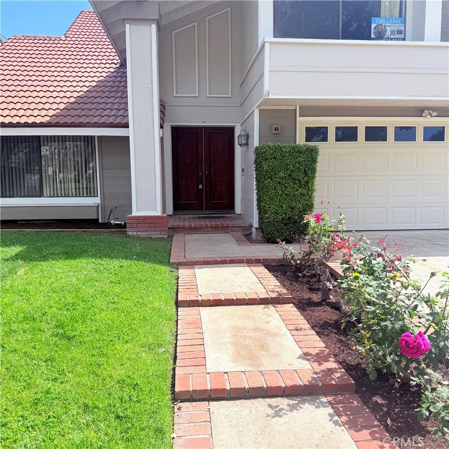 46 Christamon West Irvine, CA 92620 - Photo 4 of 65 a view of a house with a garden