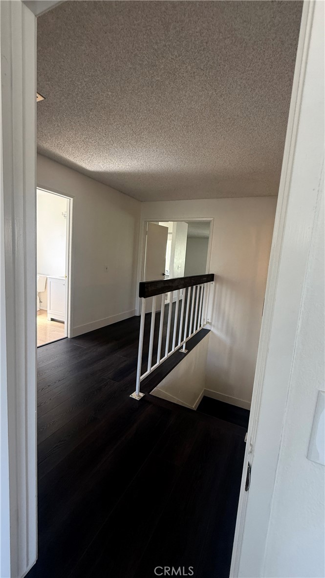 46 Christamon West Irvine, CA 92620 - Photo 42 of 65 wooden view of entryway with wooden floor