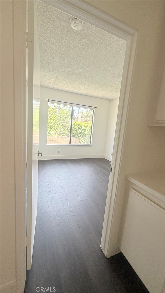 46 Christamon West Irvine, CA 92620 - Photo 43 of 65 an entryway of a house with wooden floor and windows