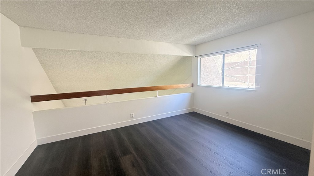 46 Christamon West Irvine, CA 92620 - Photo 53 of 65 an empty room with wooden floor and windows