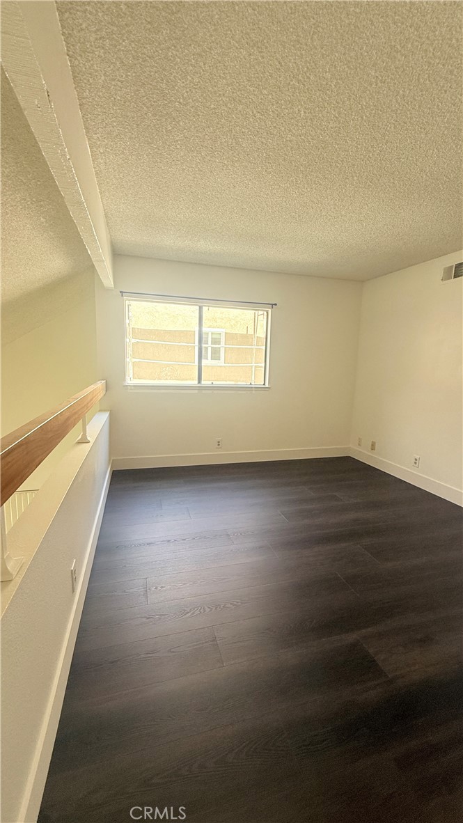 46 Christamon West Irvine, CA 92620 - Photo 57 of 65 an empty room with wooden floor and windows
