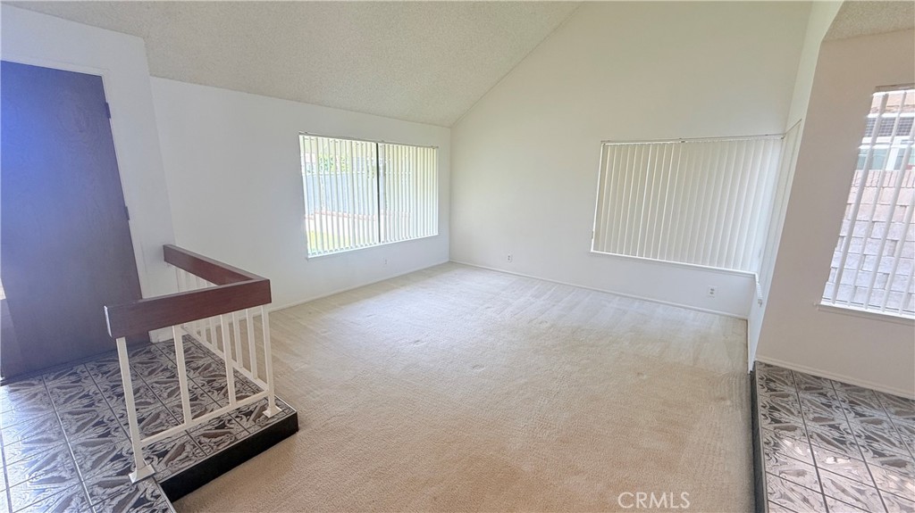 46 Christamon West Irvine, CA 92620 - Photo 7 of 65 an empty room with windows