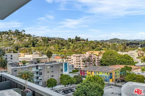 a view of a city with tall buildings