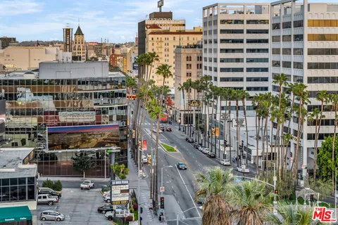 a view of a city with tall buildings