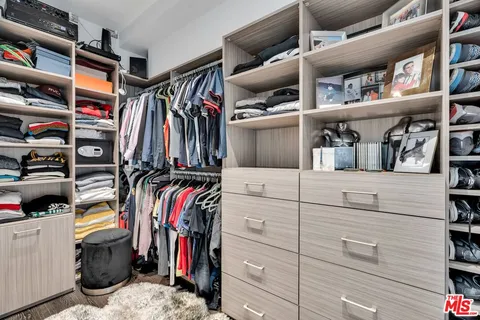 a bathroom with a double vanity sink and mirror