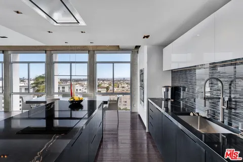 a view of a living room and dining room