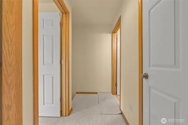 a view of a bathroom with a glass door