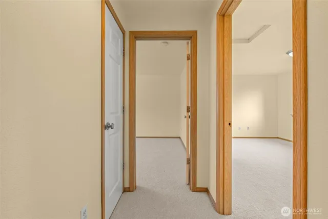 a view of a bathroom with a glass door