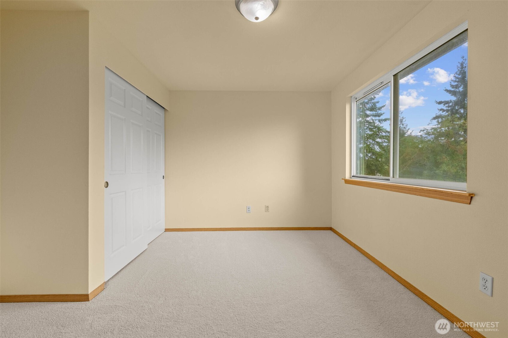 14510 West Throne Lane Southwest Lakewood, WA 98498 - Photo 17 of 28 a view of an empty room with a window