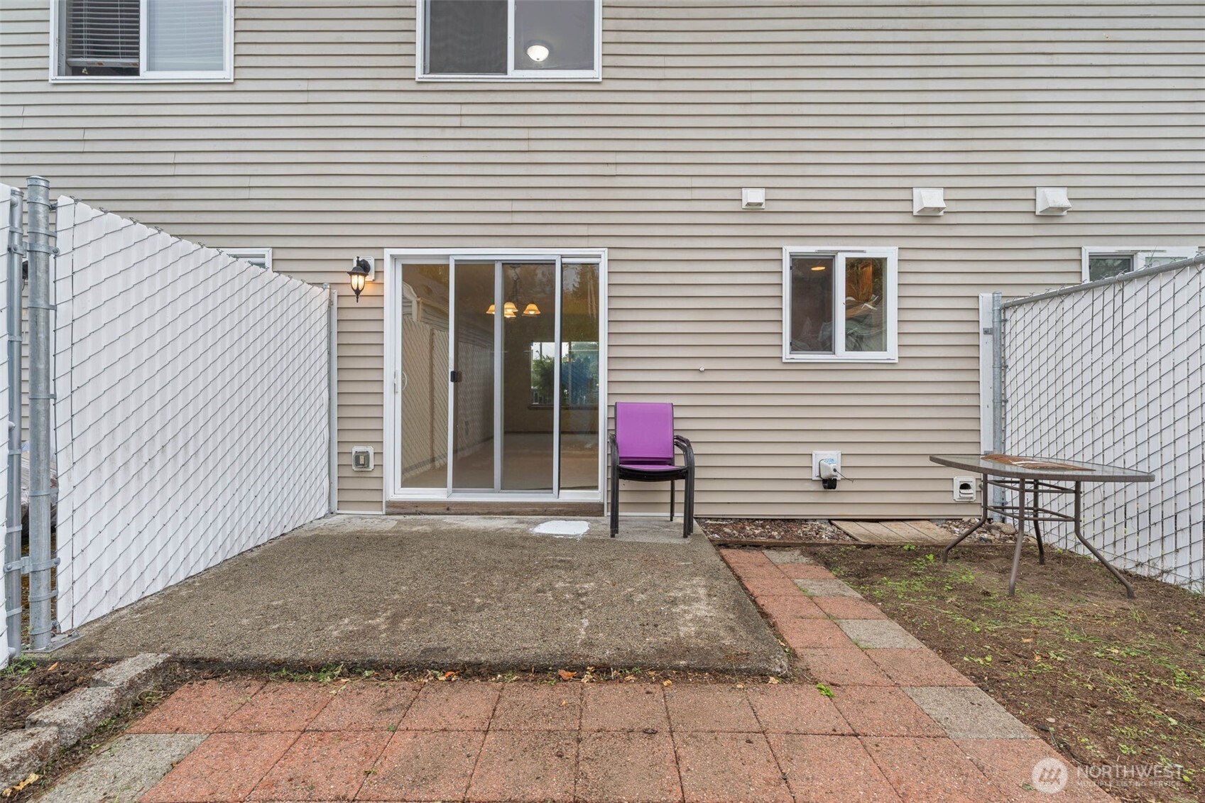 14510 West Throne Lane Southwest Lakewood, WA 98498 - Photo 20 of 28 a view of a house with a bench