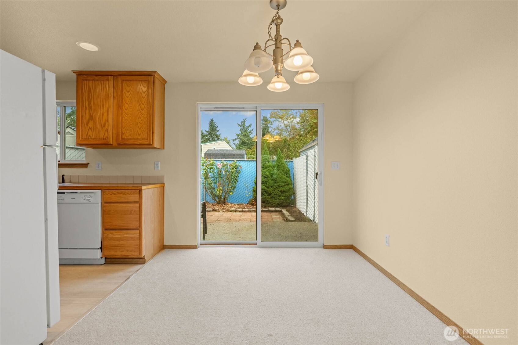 14510 West Throne Lane Southwest Lakewood, WA 98498 - Photo 8 of 28 a view of a livingroom with a chandelier fireplace and a window