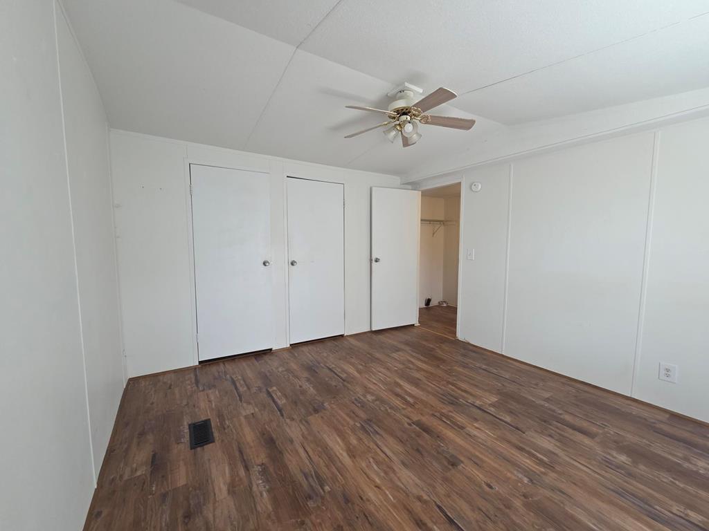 167-6 Beaumont Street Bandera, TX 78003 - Photo 8 of 10 a view of empty room with wooden floor