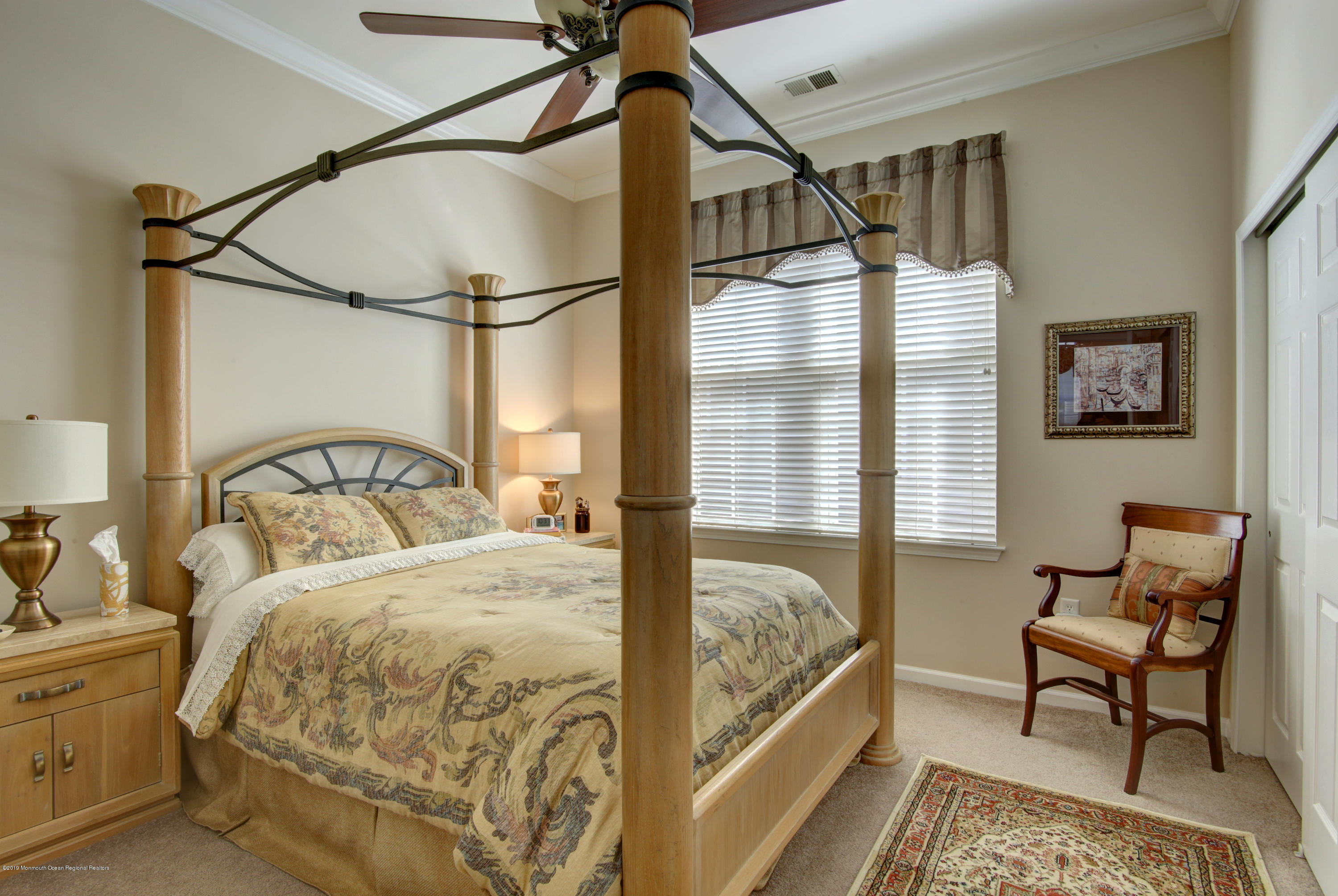 25 Hartack Road Manalapan, NJ 07726 - Photo 14 of 20 a bedroom with a bed and a window