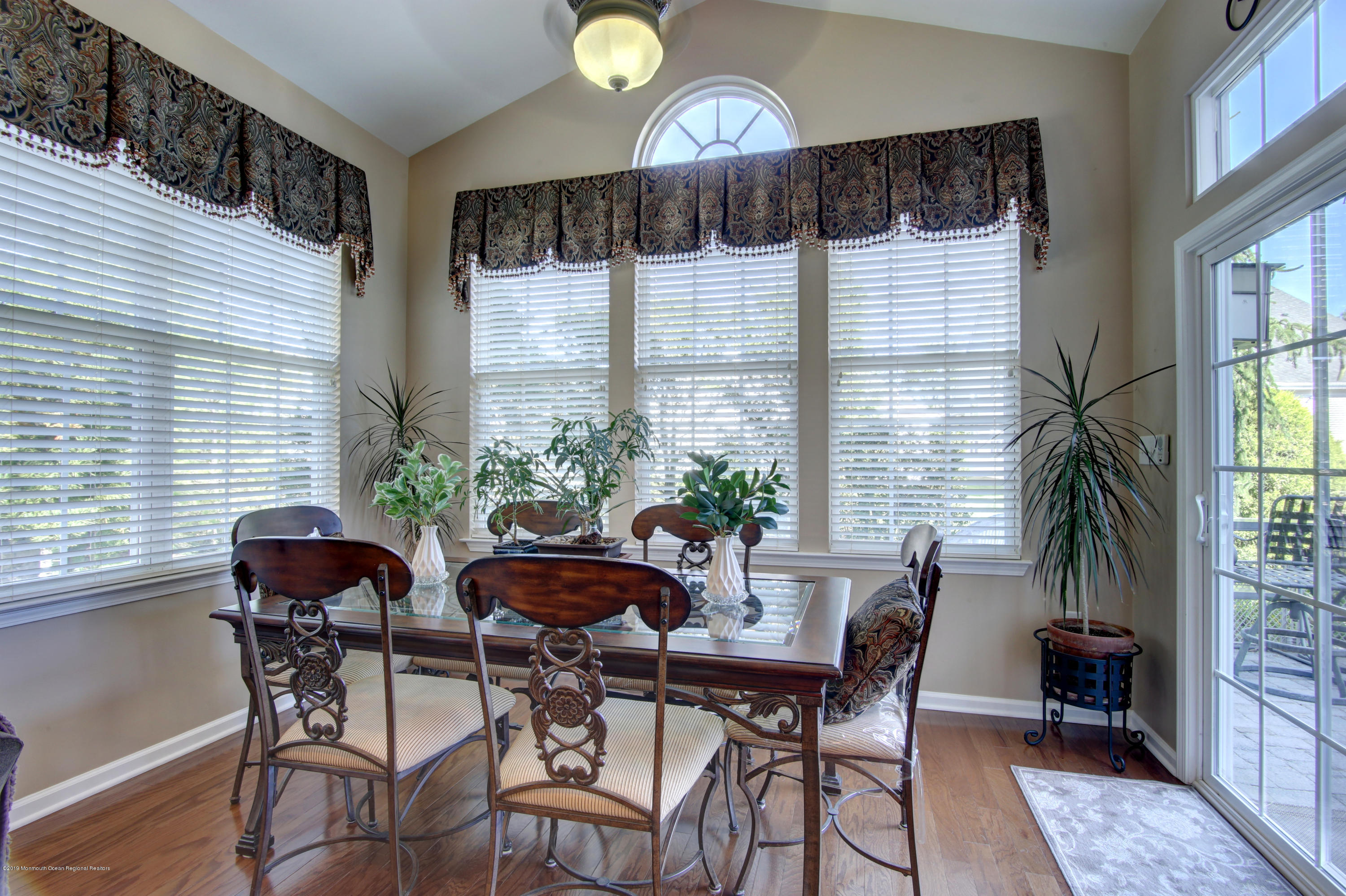 25 Hartack Road Manalapan, NJ 07726 - Photo 8 of 20 a view of a dining room with furniture and window