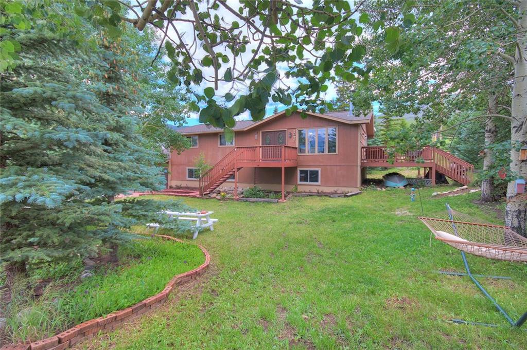627 Deer Path Road Dillon, CO 80435 - Photo 1 of 25 a view of a house with a yard