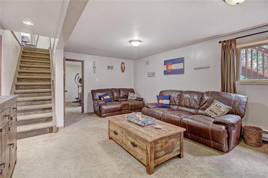 627 Deer Path Road Dillon, CO 80435 - Photo 19 of 25 a living room with furniture and a walk in closet