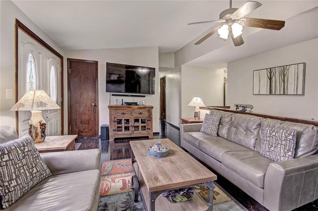 627 Deer Path Road Dillon, CO 80435 - Photo 5 of 25 a living room with furniture and a flat screen tv
